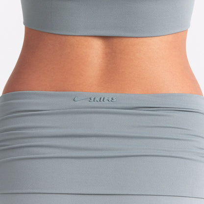 NikeSKIMS AIRY DRI-FIT™ FOLDOVER SKORT | WASHED PACIFIC