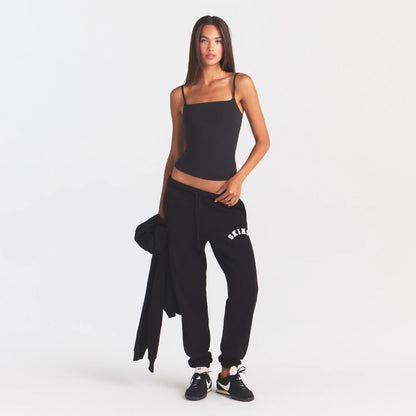 COTTON FLEECE JOGGER | ONYX SNOW ARCHED SKIMS LOGO