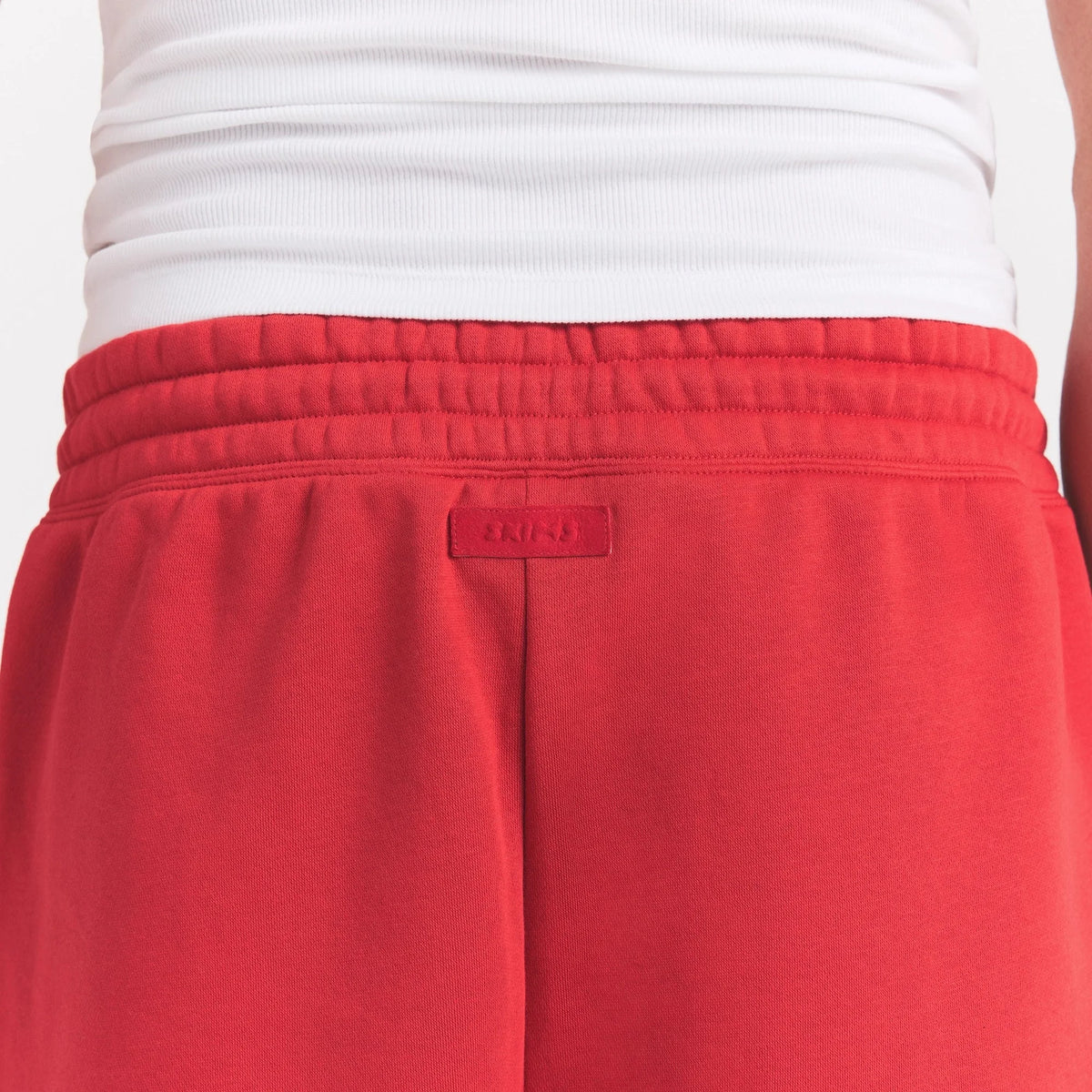 FLEECE LOUNGE MENS RELAXED SHORT | WASHED RED
