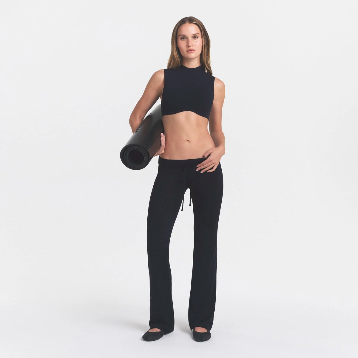 NikeSKIMS AIRY DRI-FIT™ LOW RISE MINI FLARE PANT | OBSIDIAN